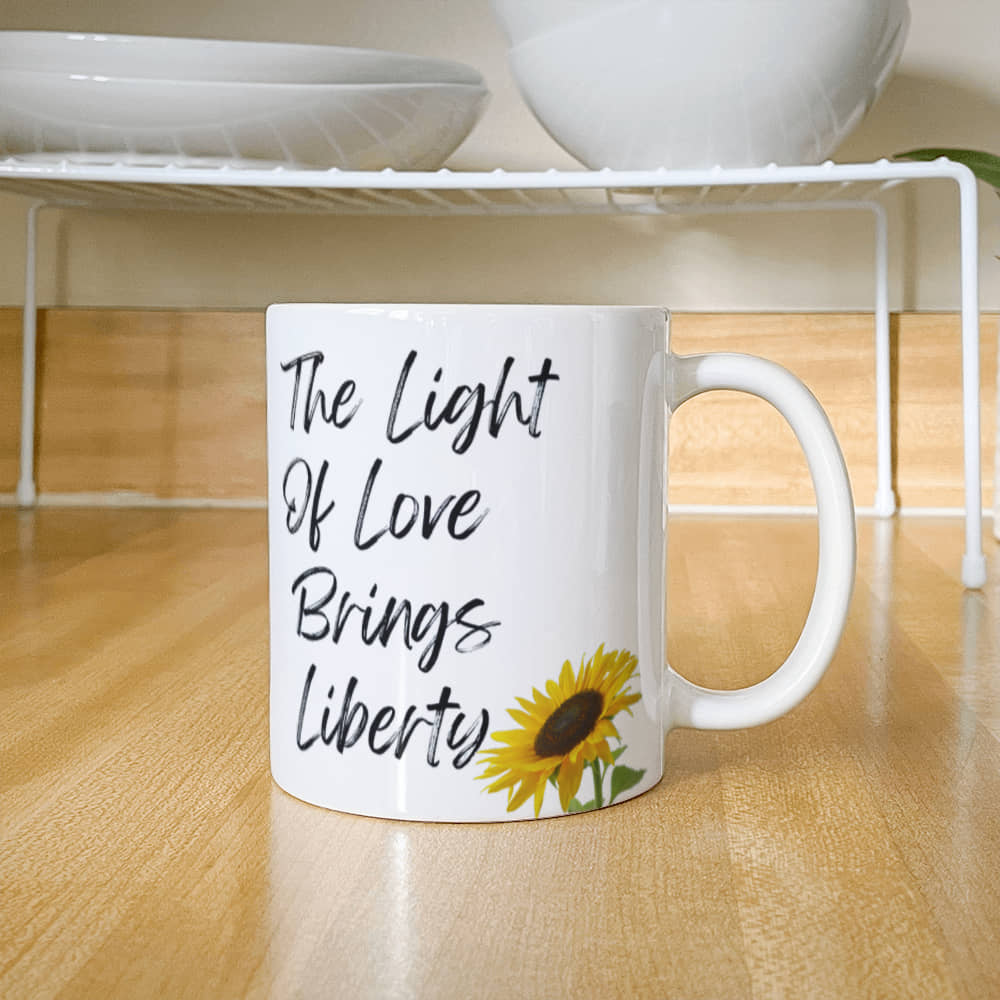 The Light Of Love Brings Liberty | White Ceramic Mug